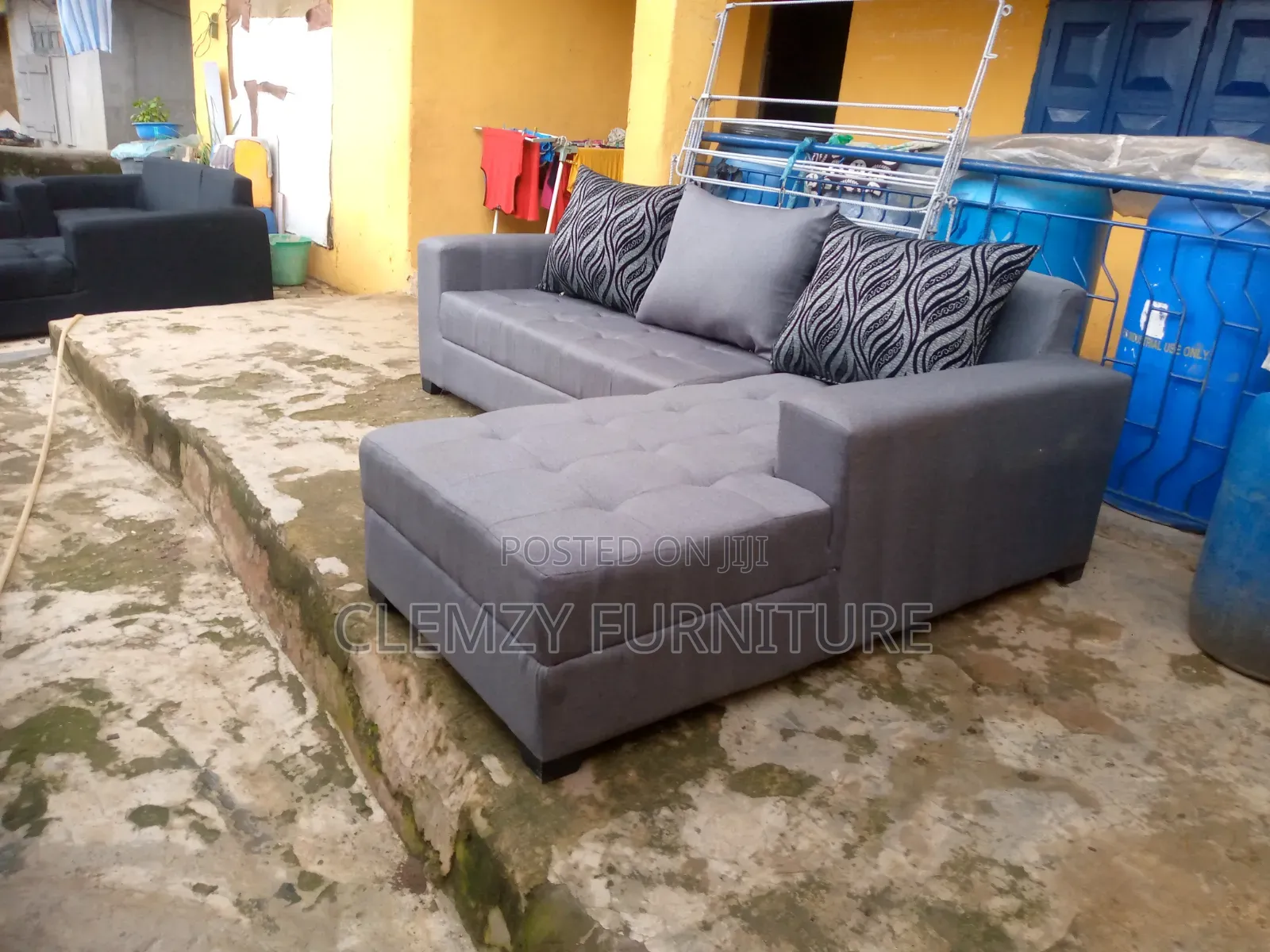 Gray L Shape Sofas and Pillows