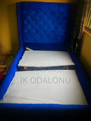Bed Frame and a Single Chair