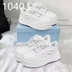Trendy All-White Chunky Platform Sneakers Feature a Bold Ridged Sole A