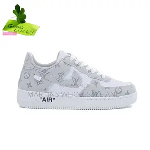 Custom Nike Air Force 1 Low-Top Sneaker Featuring a Grey and White Upp
