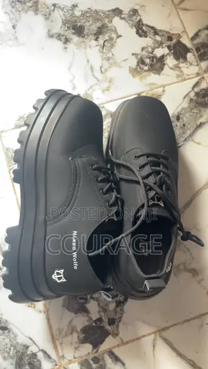 High Sole Naked Wolf Shoe