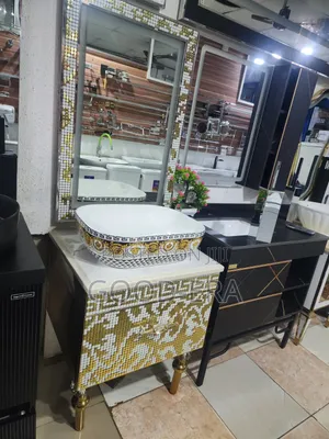 Gold Themed Cabinet Basin and LED Mirror