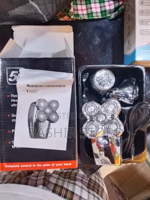 5-in-1 Rotary Electric Grooming Kit Featuring a Multi-Head Shaver