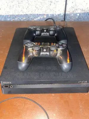 PS4 Slim 500gb With 2 Pads and 10, 2026 Games