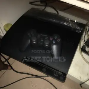 Ps3 Slim With One Pad and 10 Games Installed