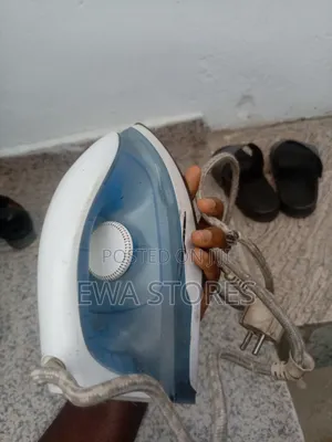 Fairly Used Pressing Iron for Sale