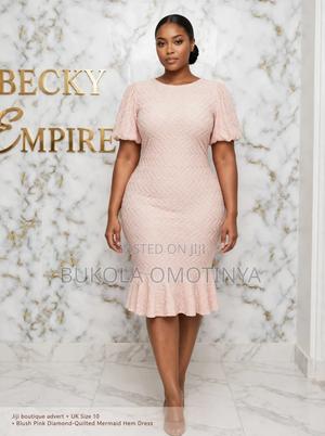 Blush Pink Textured Puff Sleeve Mermaid Hem Midi Dress