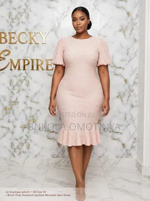 Blush Pink Textured Puff Sleeve Mermaid Hem Midi Dress