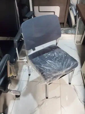 Italian Mesh Visitor Chair With Padded Cushion Seat.