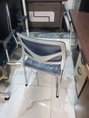 Italian Mesh Visitor Chair With Padded Cushion Seat.