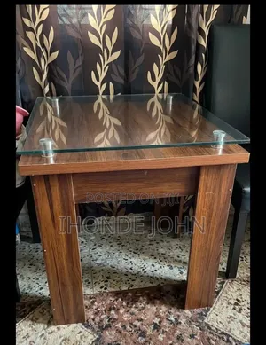 A Set of Glass Top Dinning Table With 3 Set of Chairs