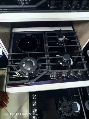 Built in 4 Burner Gas and 1 Electric Available