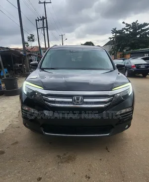 Honda Pilot Touring 4dr SUV 4WD (3.5L 6cyl 9A) 2016 Black