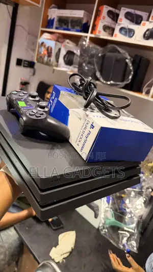 Direct Uk Used Ps4 Pro With 2 Pads and 14 Games Installed