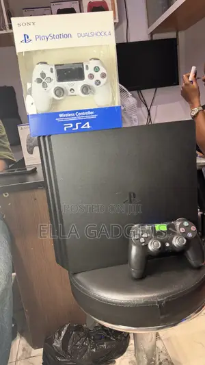 Tokunbo Ps4 Pro With Games and 2 Pads