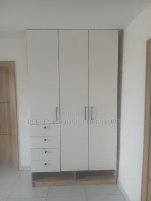 Spacious 4-Door Wooden Wardrobe With Hanging Rail (Like New)