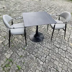 Neatly Used Black Marble Top Dinning Table and Two Chairs