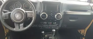 Jeep Wrangler Unlimited Sport RHD 4dr SUV 4WD (3.6L 6cyl 5A) 2014
