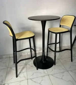 Modern Black Bistro Set Features a Round Pedestal Table Paired