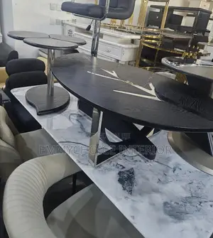 Elegant Oval Center Table With Metallic Branch Inlay