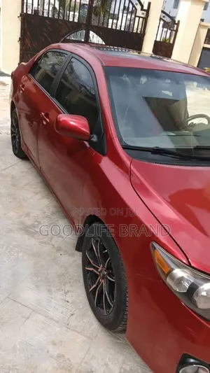 Toyota Corolla Base 4dr Sedan (1.8L 4cyl 5M) 2010 Red