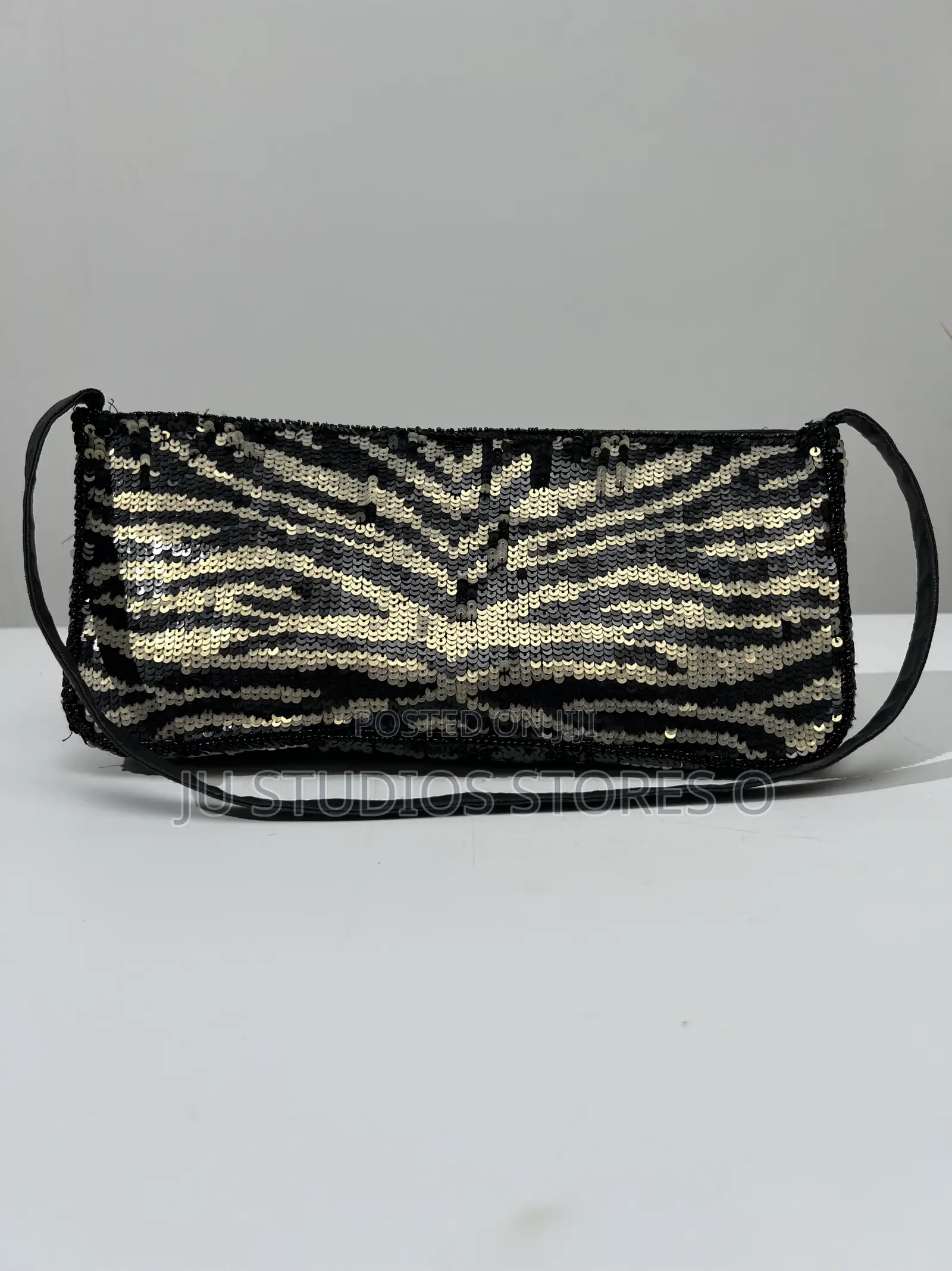Accessorize Black and Gold Sequin Zebra Clutch