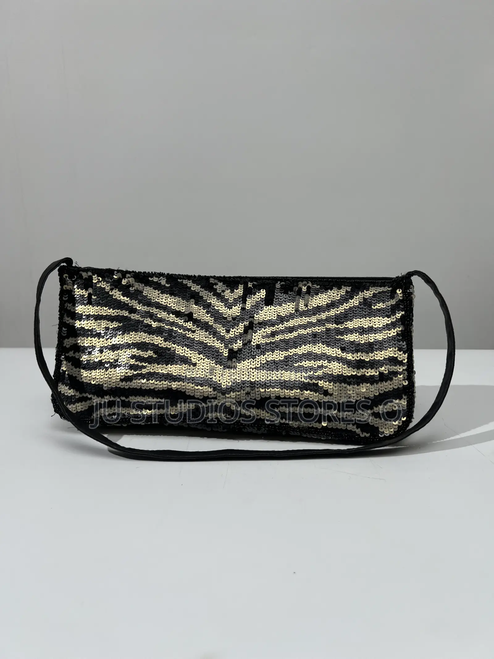 Accessorize Black and Gold Sequin Zebra Clutch