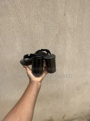 Hermès Paris Black Glossy Slide Sandals