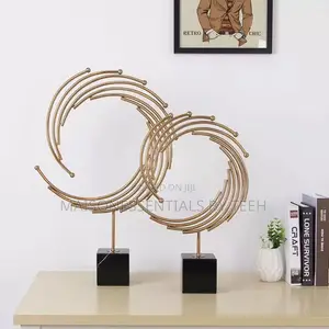 Modern Gold Metal Abstract Swirl Sculptures With Black Marble Bases
