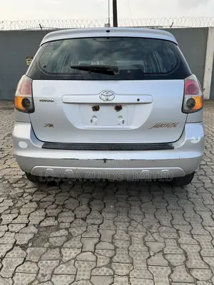 Toyota Matrix XR Hatchback FWD (1.8L 4cyl 4A) 2005 Red