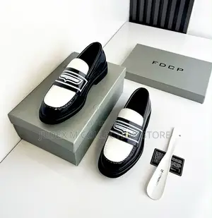 Executive Christian Loubotin and FDCP Most Wanted Luxury Shoe