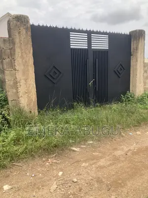 For Sale: A Fenced and Gated Plot of Land