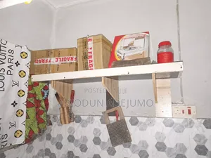 2 Neatly Used Wall-Mounted Kitchen Storage Shelves – ₦15,000