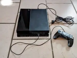 PS4 Phat With 6 Games and 2 Pads.