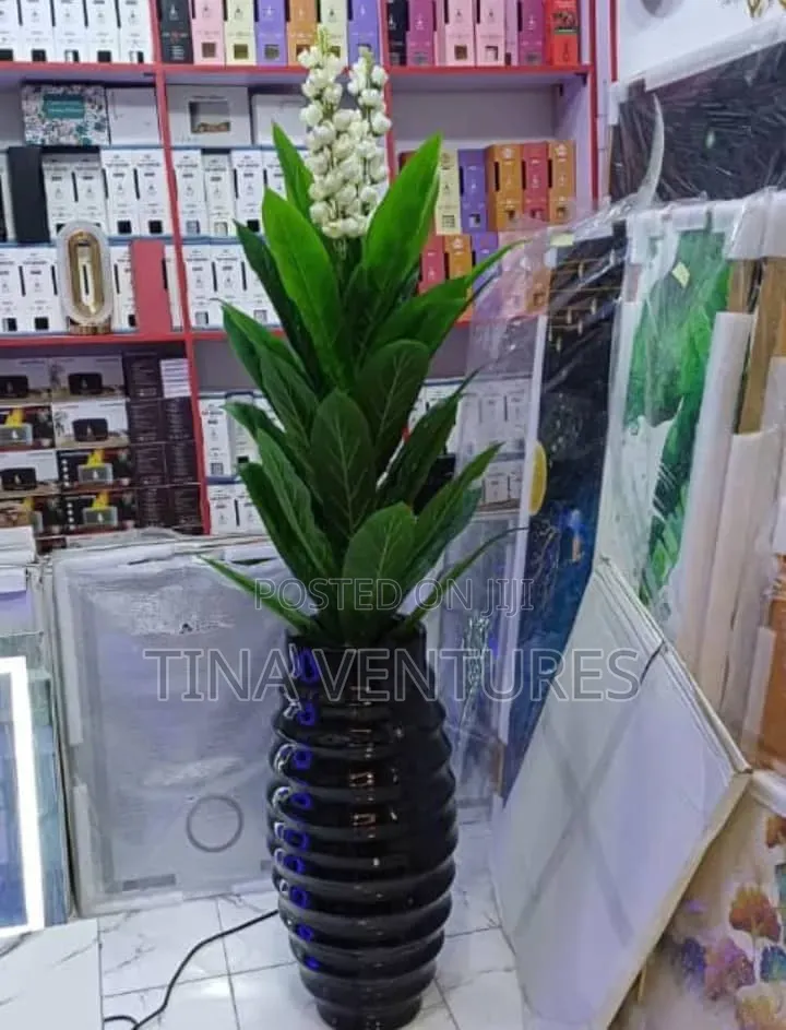 Artificial Flowers and Vase Set . Available in Different Sizes