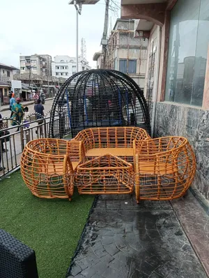Outdoor Woven Rattan Furniture Set With a Modern Woven Rattan Table