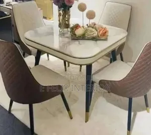 Four Seater Marble Dinning With Brown Chairs