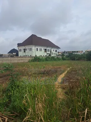 Dry Land at SatelliteTown Nasxo Estate Global C of O No Omonile