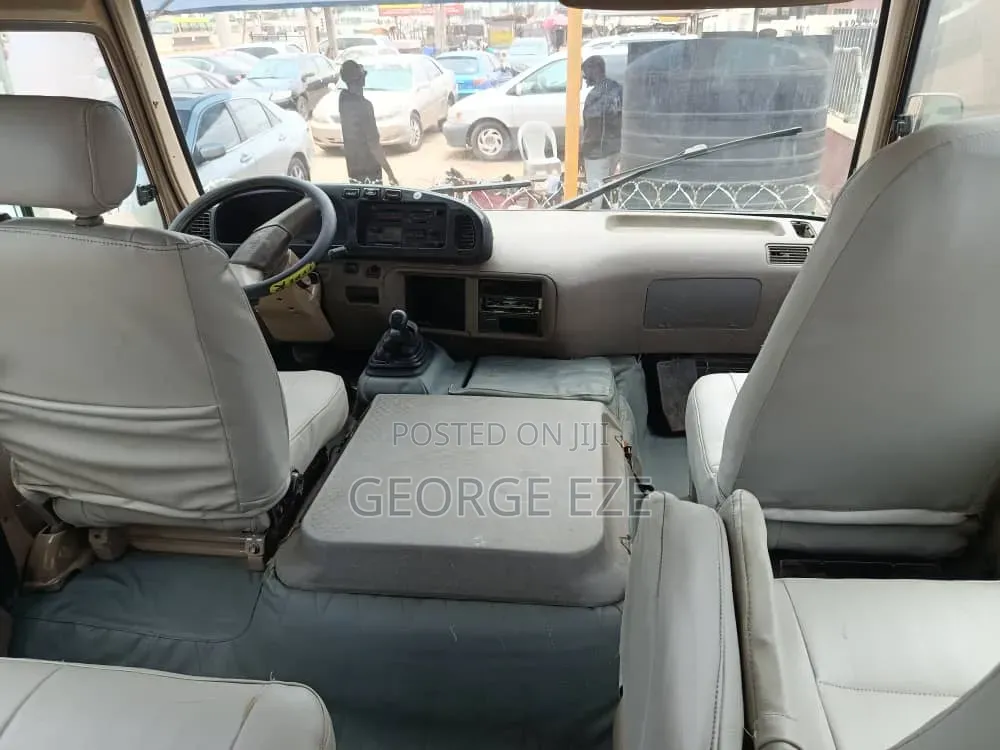 Toyota Coaster 2012 Gold