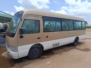 Toyota Coaster 2012 Gold