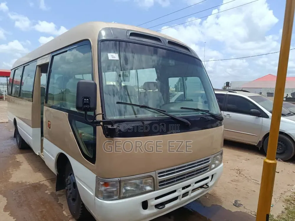 Toyota Coaster 2012 Gold