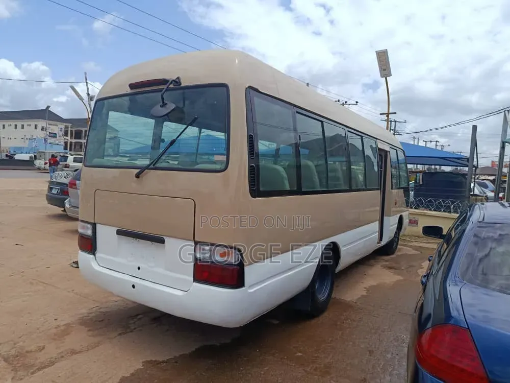 Toyota Coaster 2012 Gold
