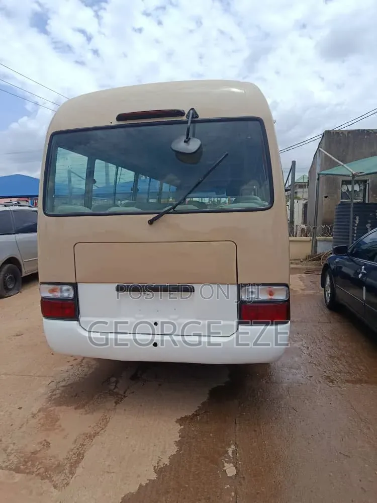 Toyota Coaster 2012 Gold