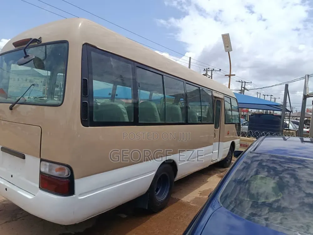 Toyota Coaster 2012 Gold