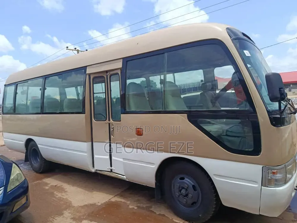 Toyota Coaster 2012 Gold