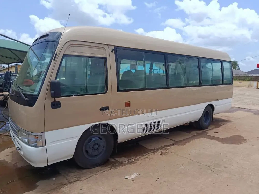 Toyota Coaster 2012 Gold