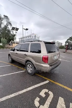 Honda Pilot EX-L 4x4 (3.5L 6cyl 5A) 2004 Gold