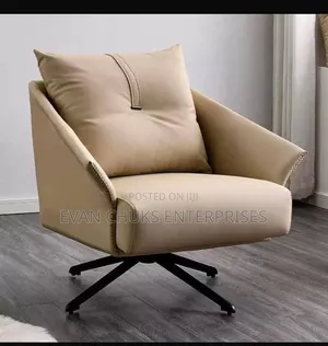 Swivel Arm Chair Available