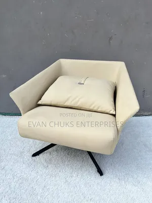 Swivel Arm Chair Available