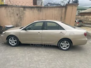 Toyota Camry LE 2024 Gold